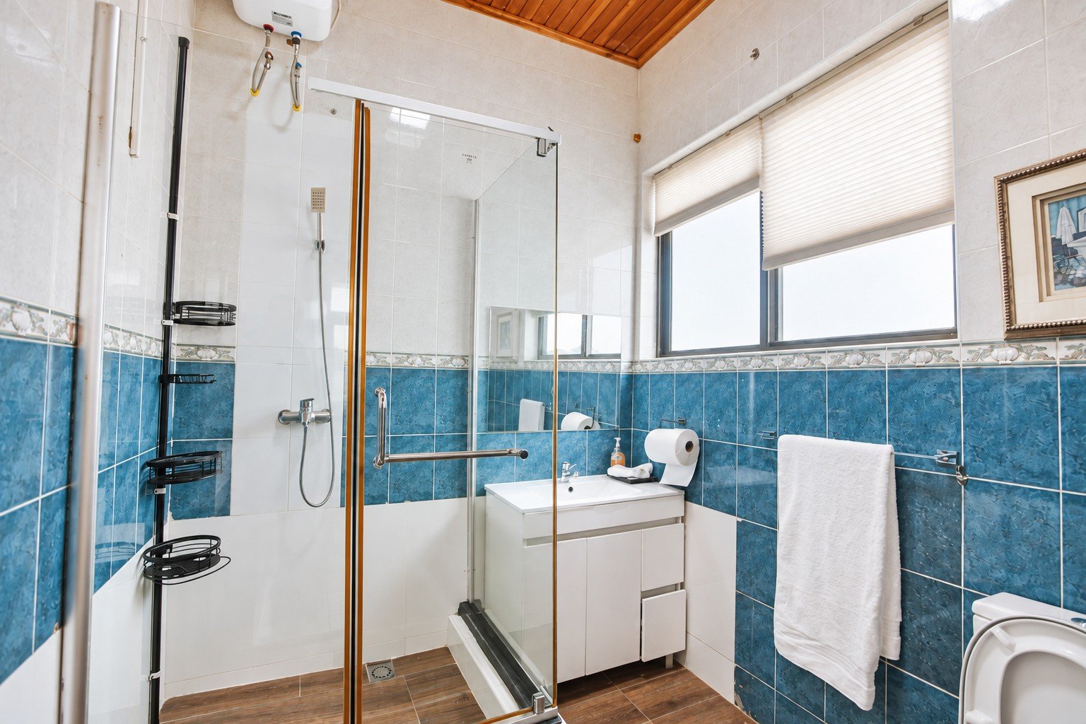 Guest room bathroom with a shower at Donna’s Place